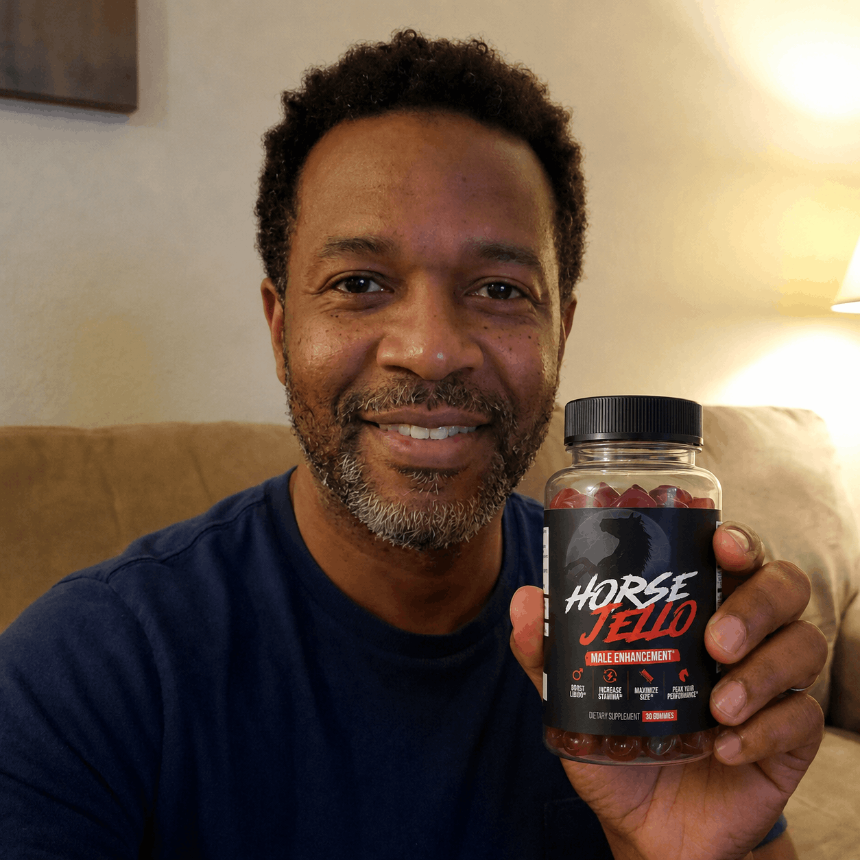 HorseJello verified customer holding the male enhancement gummies bottle at home